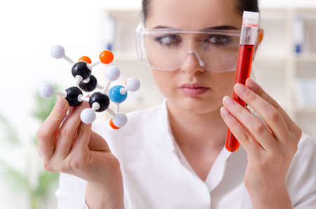Young female chemist working in the labの写真素材