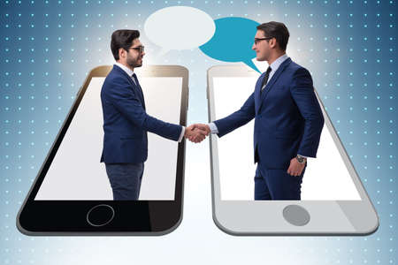 Concept of communication with businessmen handshakingの写真素材