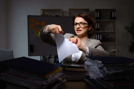 Female employee suffering from excessive work