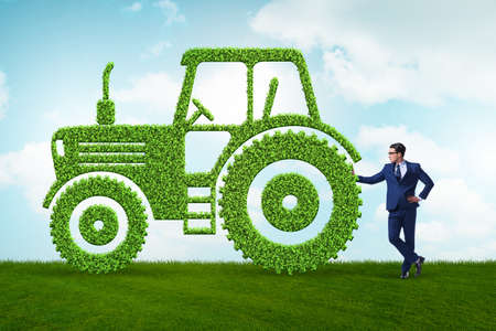 Businessman with green ecological vehicleの写真素材