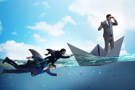 Businessmen in competition concept with sharkの写真素材