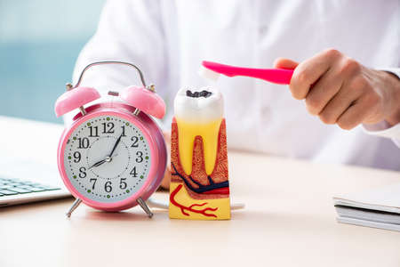 Male doctor stomatologist working in the clinic