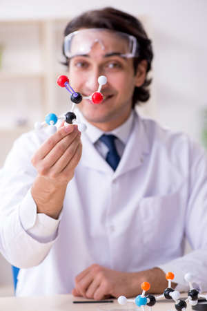 Young male scientist working in the labの写真素材