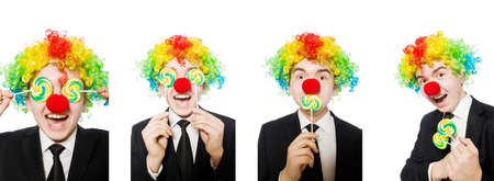 Clown with lollipop isolated on whiteの写真素材