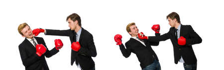 Pair of businessmen boxing on whiteの写真素材