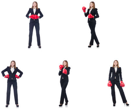 Businesswoman with boxing gloves isolated on whiteの写真素材