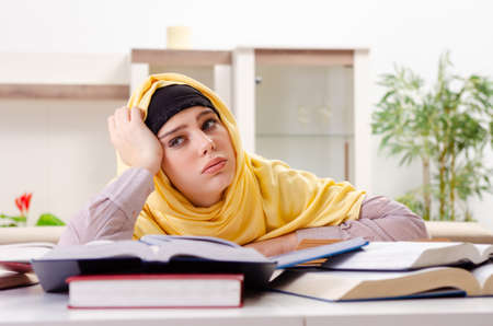 Female student in hijab preparing for examsの写真素材