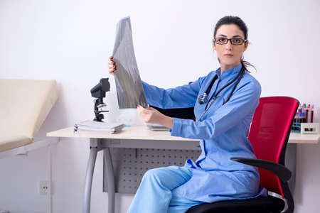 Young female doctor radiologist working in the clinicの写真素材