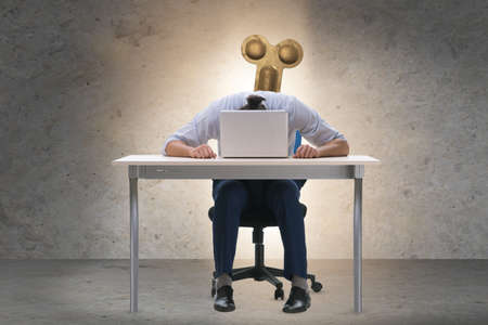 Employee losing energy from too much workの写真素材