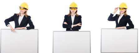 Young female builder with whiteboardの写真素材
