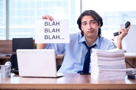 Young employee unhappy with excessive work