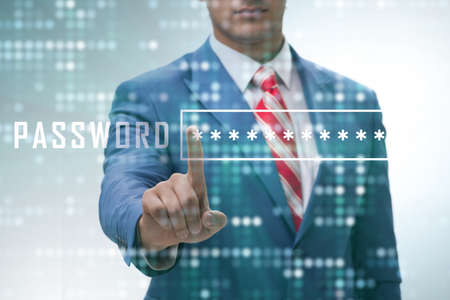 Man in digital security concept pressing buttonの写真素材