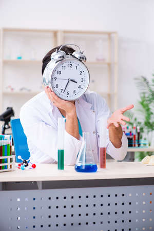 Young male chemist working in the labの写真素材