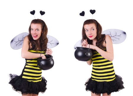 Young woman in bee costume isolated on whiteの写真素材