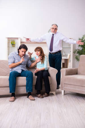 Young pair visiting experienced doctor psychologistの写真素材