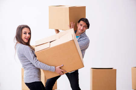 Young pair moving to new flatの写真素材