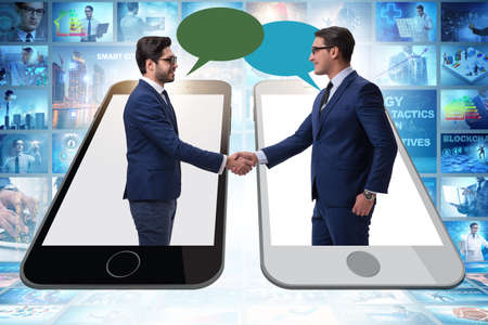 Concept of communication with businessmen handshaking
