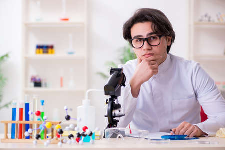 Young male biochemist working in the labの写真素材