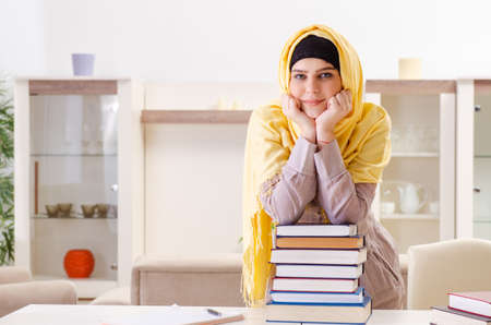 Female student in hijab preparing for examsの写真素材