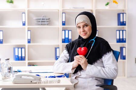 Young doctor in hijab working in the clinicの写真素材
