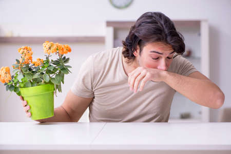 Young man suffering from allergyの写真素材