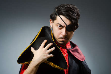 Man pirate against dark backgroundの写真素材
