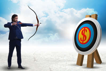 Businessman aiming arrow with bow