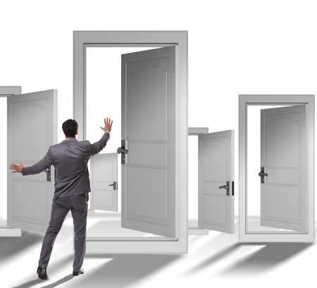 Businessman facing many business opportunitiesの写真素材