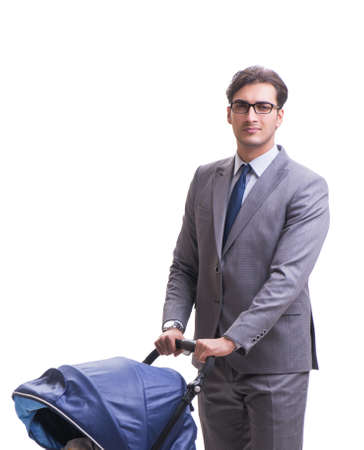 Young businessman nursing child in pram isolated on whiteの写真素材