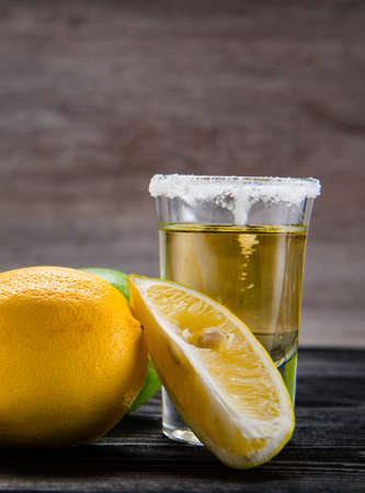 Tequila drink served in glasses with lime and saltの写真素材