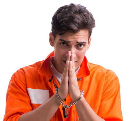 Handcuffed handsome businessman isolated on white backgroundの写真素材