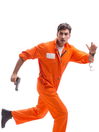 Prisoner with gun isolated on white backgroundの写真素材