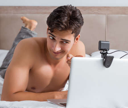 Young sexy man in online dating conceptの写真素材