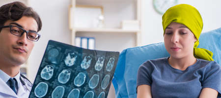 Cancer patient visiting doctor for medical consultation in cliniの写真素材