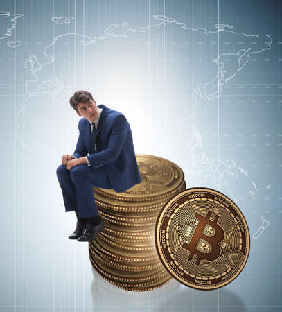 Businessman sad about bitcoin price crashの写真素材