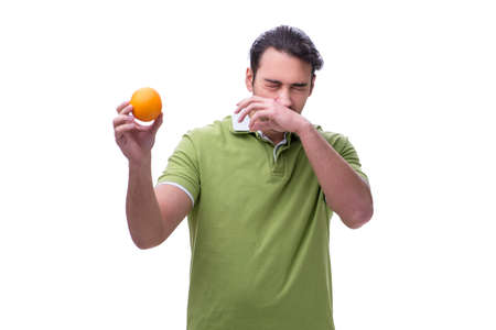 Young man suffering from allergy isolated on whiteの写真素材