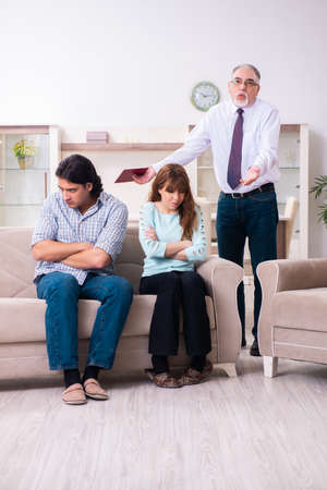 Young pair visiting experienced doctor psychologistの写真素材