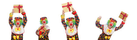 Clown with giftbox isolated on whiteの写真素材