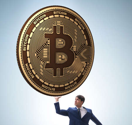 Businessman holding bitcoin in cryptocurrency blockchain concept