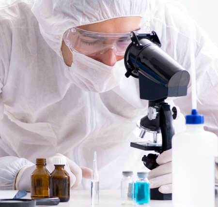Two chemists working in the lab