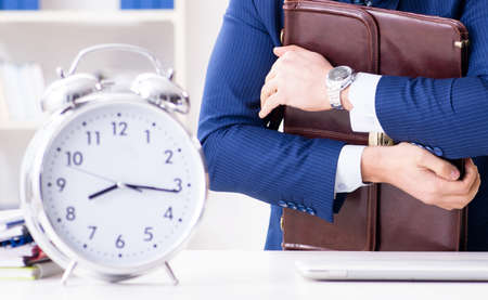 Businessman in rush trying to meet deadline