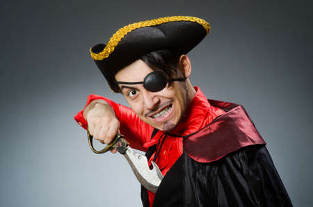 Man pirate against dark backgroundの写真素材