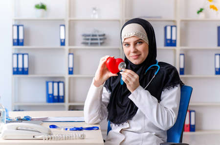 Young doctor in hijab working in the clinicの写真素材