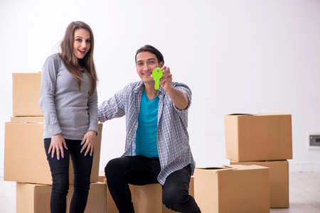 Young pair moving to new flat