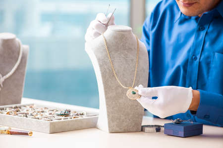 Young jeweler working in his workshop