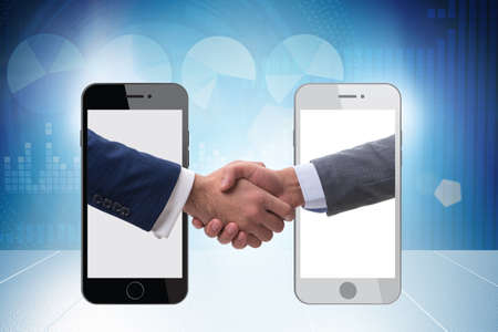 Concept of communication with businessmen handshakingの写真素材