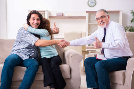Young pair visiting experienced doctor psychologistの写真素材