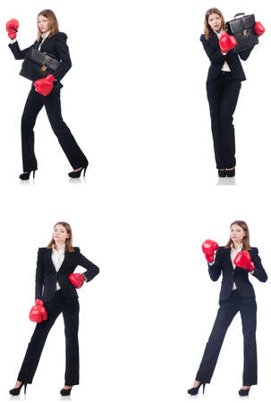 Businesswoman with boxing gloves isolated on whiteの写真素材