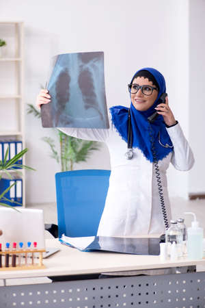 Female doctor in hijab working in the hospitalの写真素材