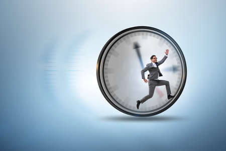 Businessman employee in time management concept